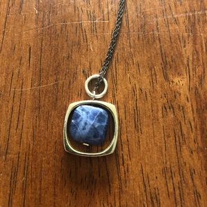Silver and blue stone necklace.